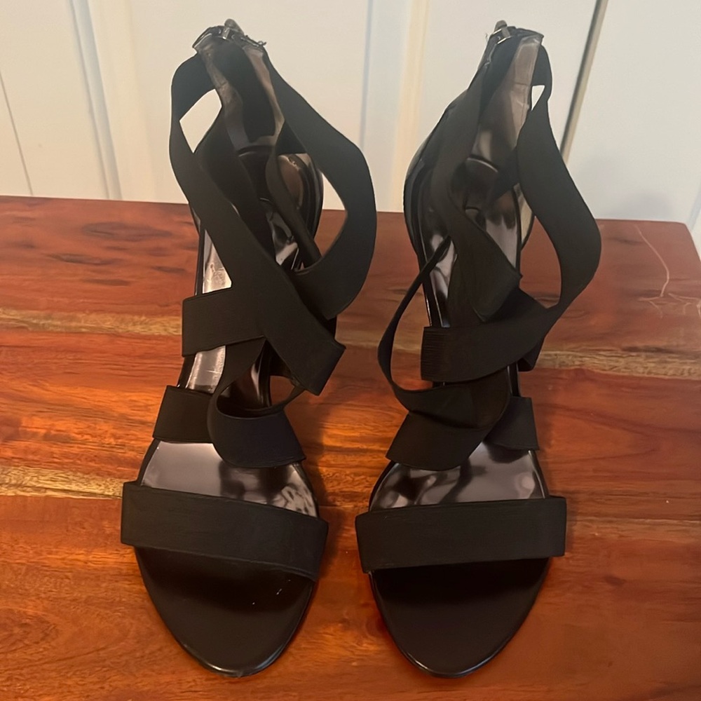 Pre-loved heels by Carlos Santana.